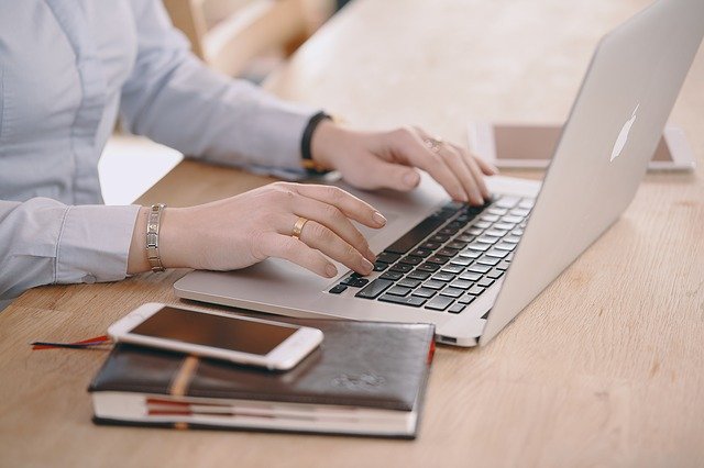 A woman with her laptop computer