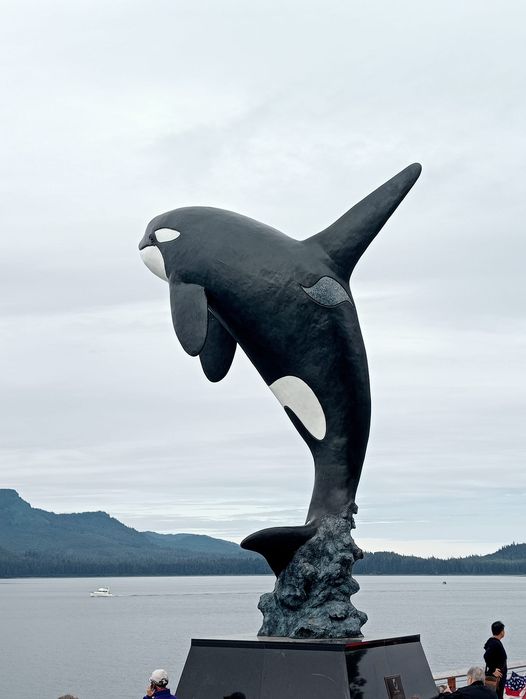 A statue of an orca