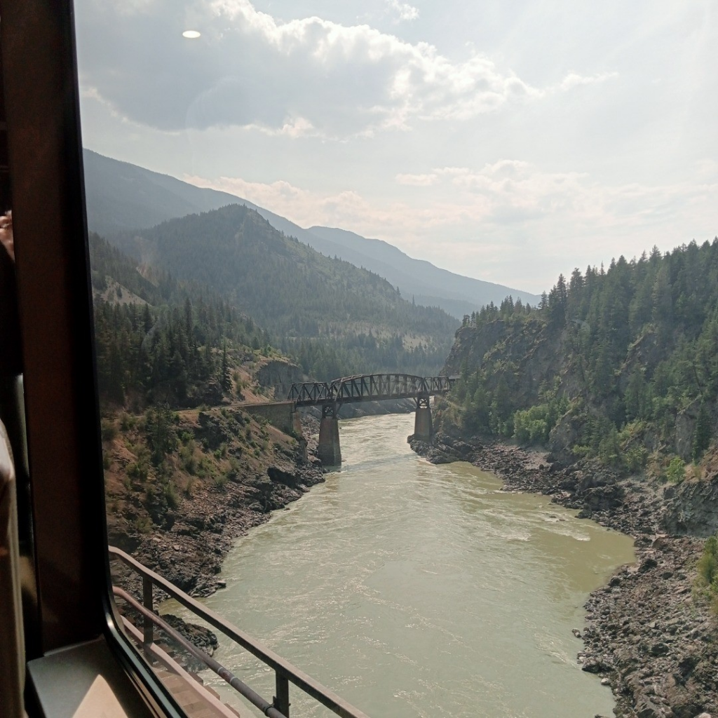 A bridge over a river in the Rockies
